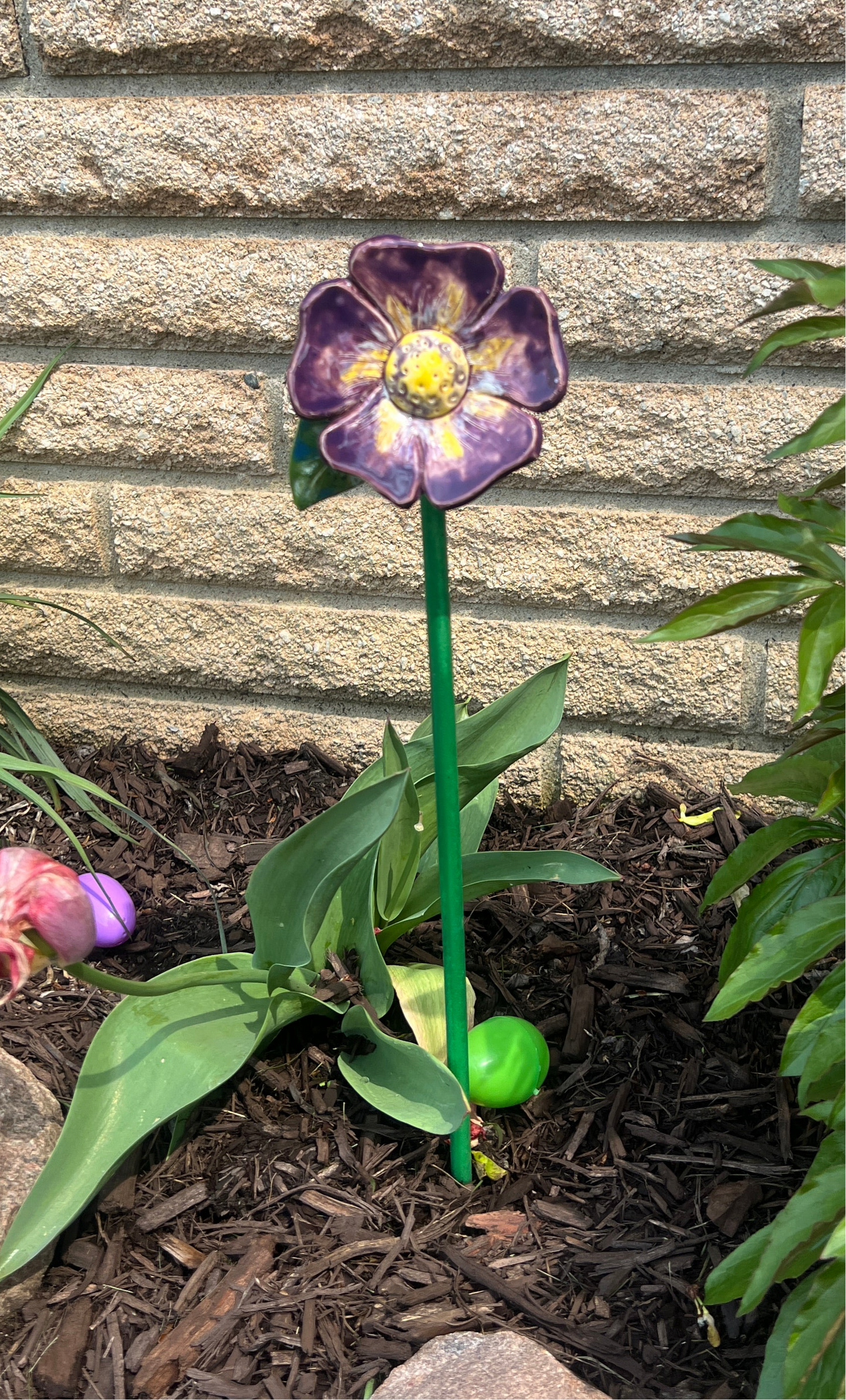 *Example only* -This picture shows what the garden ornament would look like in your flower garden.